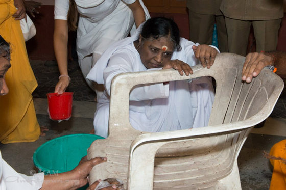Amma cleaning a chair