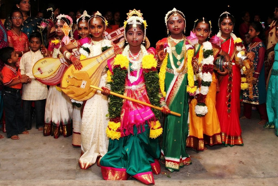 Young girls dressed as Durga, Lakshmi and Saraswati