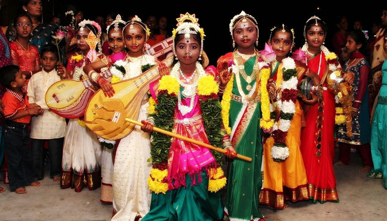 Girls dressed as forms of the Divine Mother