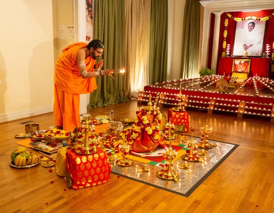 Br. Ramanandamrita Chaitanya performing a puja
