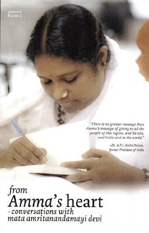 Book cover photo showing Amma writing in a book