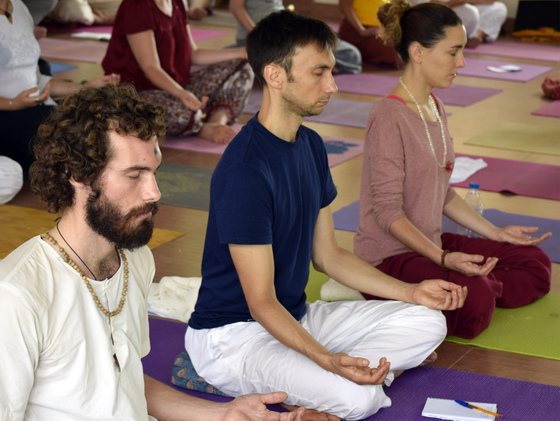 People meditating