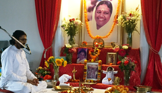 Br. Ramanand sitting before beautiful altar