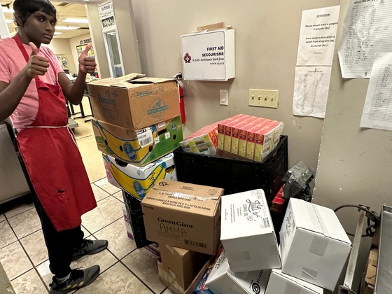 Knights Table staff with rescued food donation