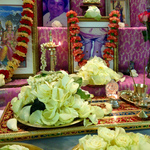 Shiva Lingam and Nandi buried in flower petals