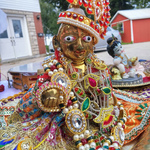 A Ladoo Gopal murti with jewelled clothes