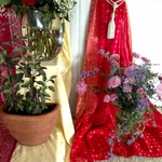 Tulsi basil and chrysanthemums on the altar