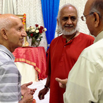 Swami Ramakrishnananda talking to devotees