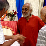 Swami Ramakrishnananda smiling at devotees