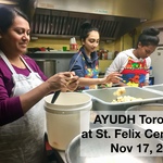 Two teens and one adult chopping potatoes at St. Felix Centre