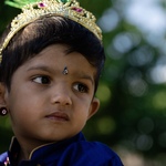 Little boy dressed as Krishna
