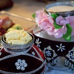 Decorated pots of milk and butter for Krishna
