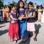 Girls carrying Sri Krishna in procession