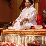 Amma meditating on stage
