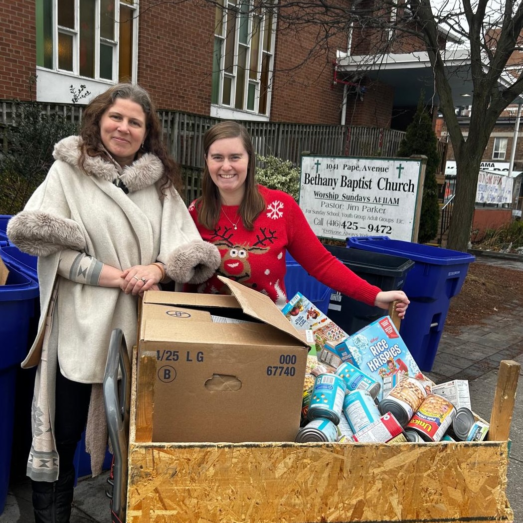 Amma Canada volunteer delivering non-perishable food and clothing to Bethany Baptist Church