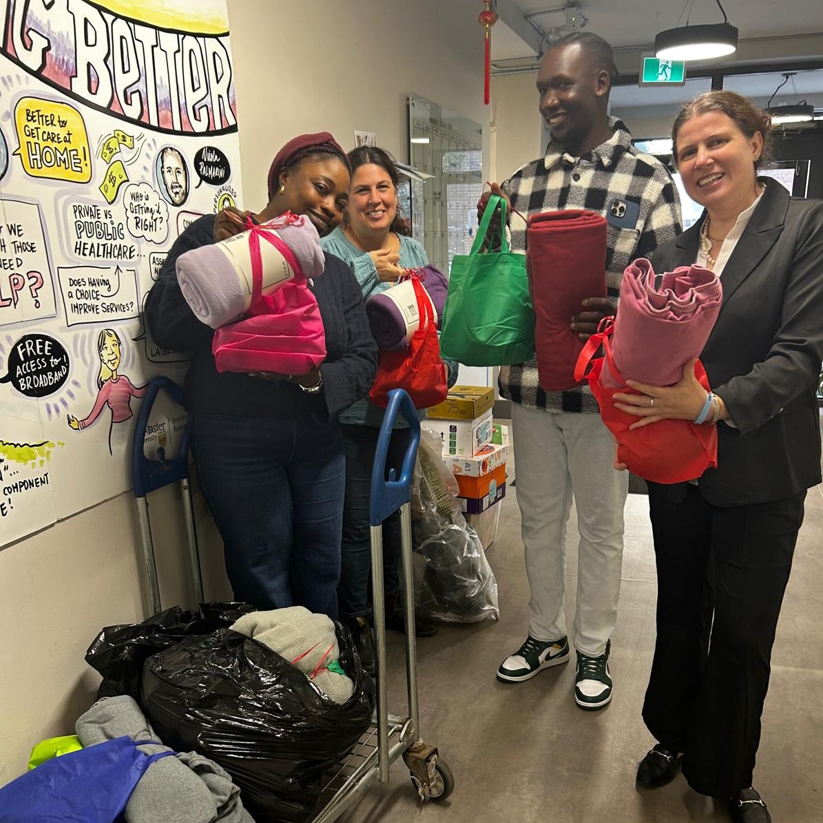 Volunteer delivering homeless care packages to Dixon Hall staff