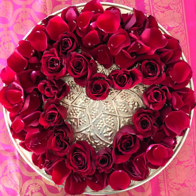 Roses arranged on platter to make a heart