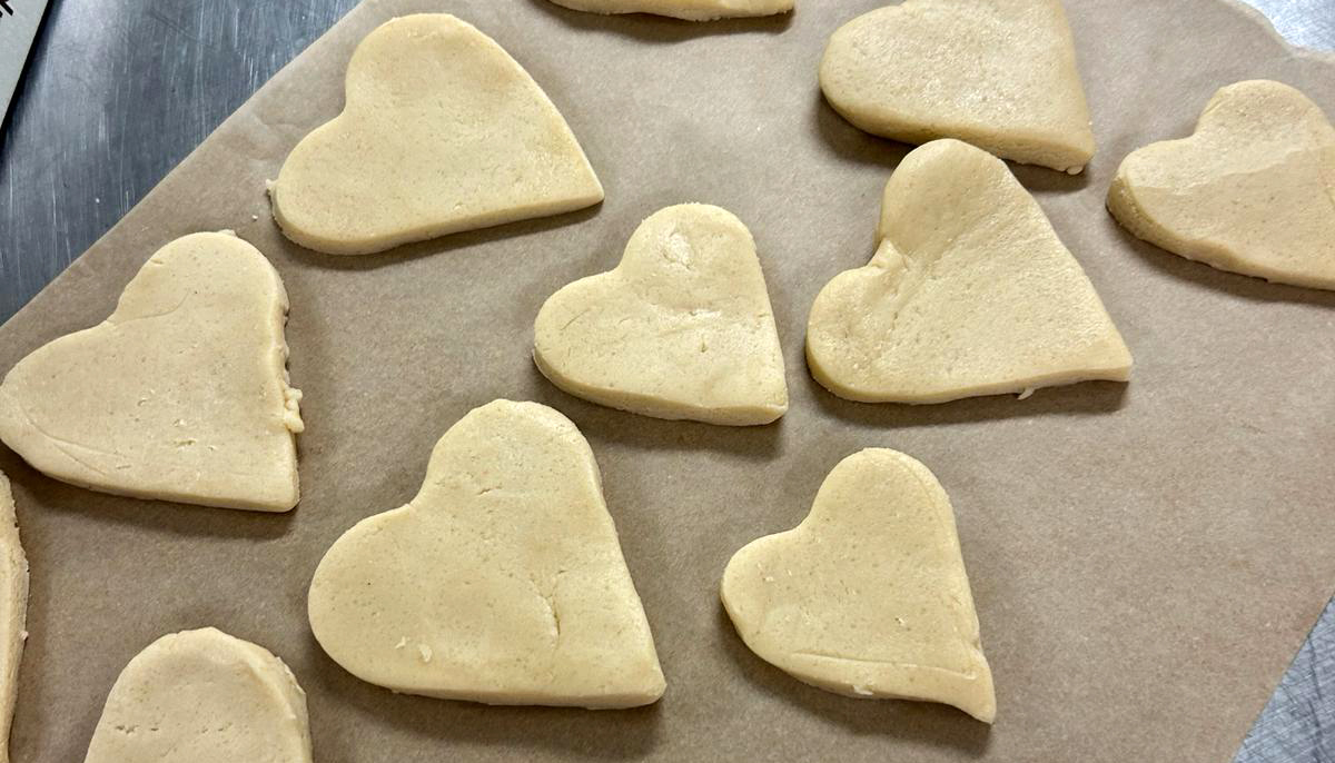 Heart-shaped shortbread cookies about to be baked